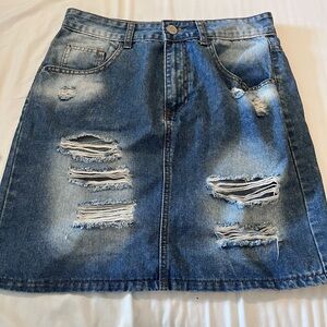 Denim skirt bought in South Africa. Worn once.